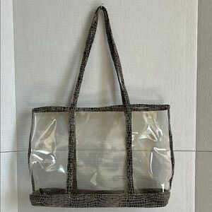 Clear plastic tote/stadium bag.